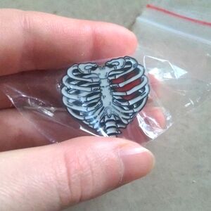4/$20 Skeleton ribcage heart enamel pin.